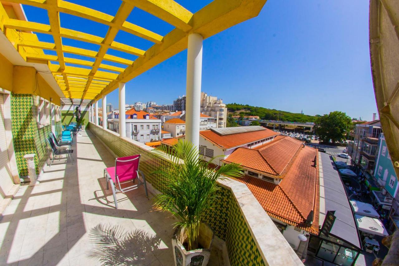 Lar Dois Coracoes Hostel Alges Bagian luar foto